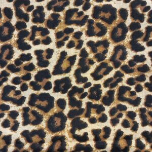 Tissu motif léopard marron et noir fond beige