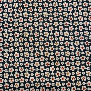 Tissu fond bleu, avec toutes petites fleurs blanches